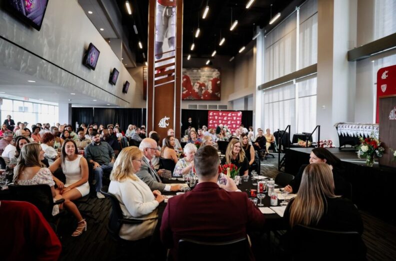 Attendees sitting at tables during a Senior Recognition Luncheon.