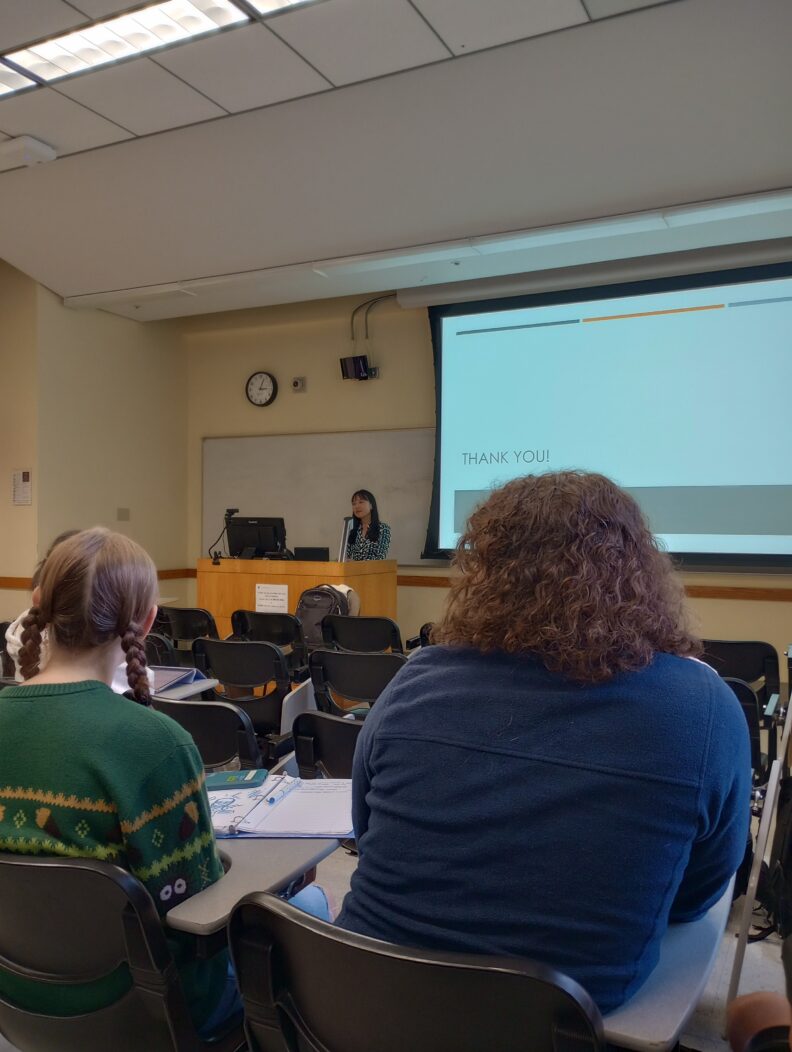 A shot from the back of the classroom during a presentation by Heeju Sohn.