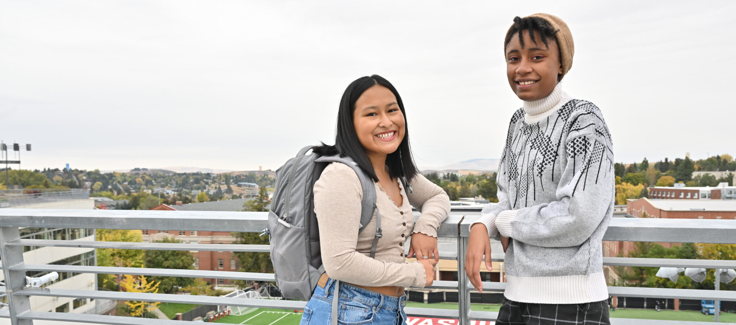 Two students meeting outside.