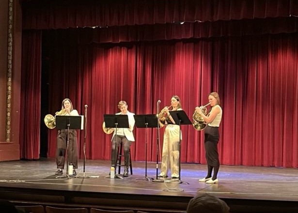 Genghis Barbie performing on stage.