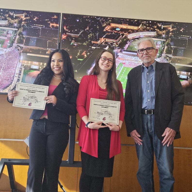 Allison McFall, Hannia Hernanadez Mendoza receiving awards.
