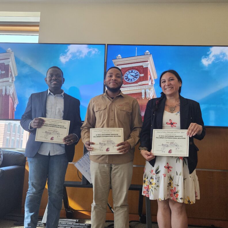 Joseph Akowuah, Sylvester Andam, Shae Ortega holding awards.