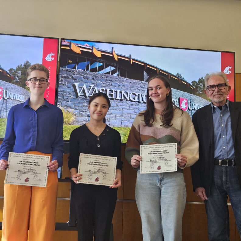 Galio Gray, Hiroko Obo, Emma Soderstrom holding awards.