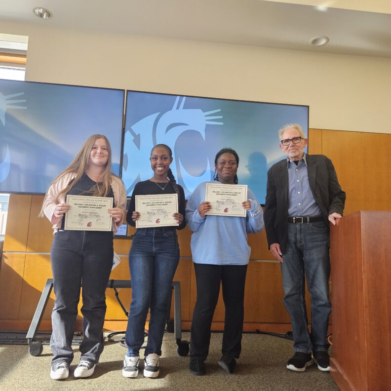 Abigail Amoani, Alexis Kamende, Roberta Simonson holding awards
