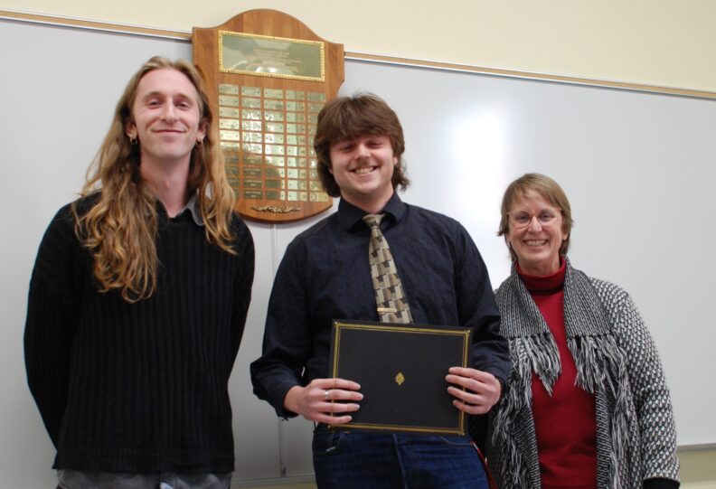 Steven Brand receiving the Ames Family Scholarship in Mathematics from Garrett Kepler and Judi McDonald.
Left to Right: Garrett Kepler, Steven Brand, and Judi McDonald
