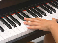hand on piano keys