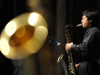 Stduent playing saxophone
