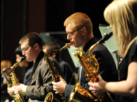Students playing jazz saxophones