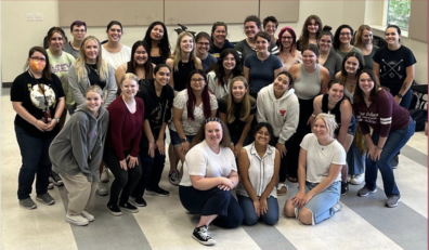 Chamber Singers posing in group.
