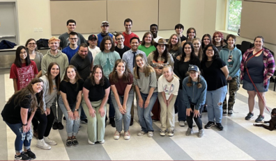 Chamber Singers posing in group.