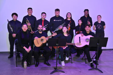 Mariachi Leones del Monte members with instruments.