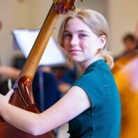 Student with double bass.