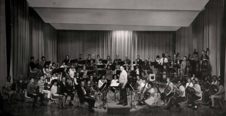 Orchestra members on stage, October 11, 1966. (photo by Robert O. Bullis/Washington State University)
