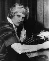 Lyubov Sirota at typewriter.