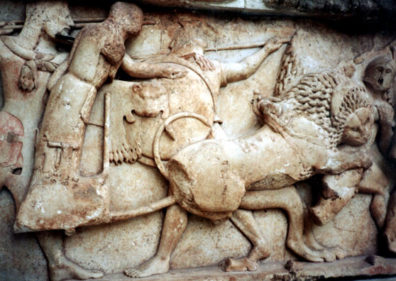 DELPHI: Lion attacking a hoplite (foot soldier), from the Gigantomachy (battle against the Titans) originally part of the north frieze of the Treasury of the Siphnians.