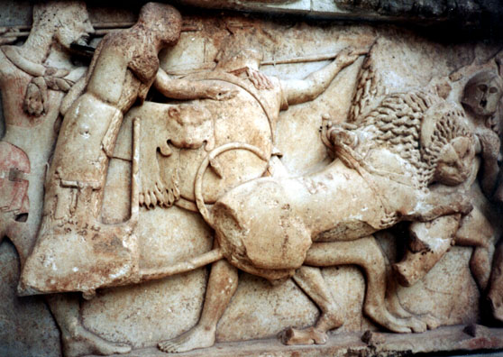 DELPHI: Lion attacking a hoplite (foot soldier), from the Gigantomachy (battle against the Titans) originally part of the north frieze of the Treasury of the Siphnians.