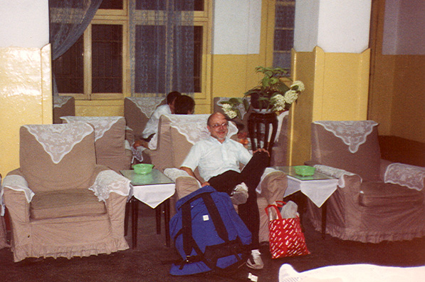 TRAIN STATION: That night, in a torrential thunderstorm, we headed for the train station, where we waited in a room filled with dozens of armchairs adorned with lace antimacassars. On TV: a wild variety of music: Banchieri's Festivo Animale, Flight of the Bumblebee, a Mozart overture.