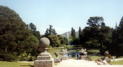 POWERSCOURT: The formal garden is anchored by this spectacular pond. In the center is a replica of Bernini's Triton fountain from the Piazza Barberini in Rome (mistakenly referred to by many people as the "Zeus Fountain at Powerscourt"), and there is a winged Pegasus on each side of the path.