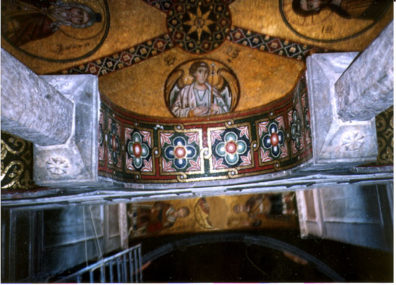OSSIOS LOUKOS: An angel on the ceiling between two pillars.
