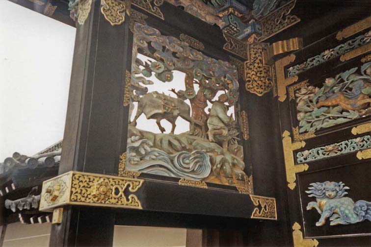 KYOTO: A few details of the ornate carving on the gate. May 24, 1998