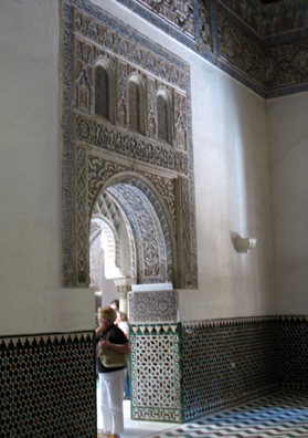 SEVILLA: Arched doorway leading to an enclosed patio.