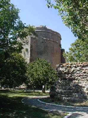 RED BASILICA: At the foot of the Acropolis hill is the so-called "Red Basilica" with its imposing twin towers. This vast brick structure was originally built as a temple to the synthetic late Roman cult of Isis, Serapis, and Harpocrates...