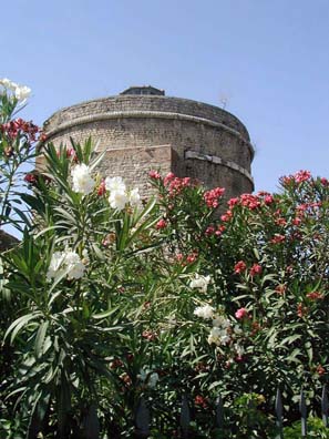 RED BASILICA: It was viewed as the throne of the Devil by Christians (see Revelation 2:1-7) but later converted by them into a Christian church. With the coming of Isam the tower on the right was converted into a mosque which is still functioning today.