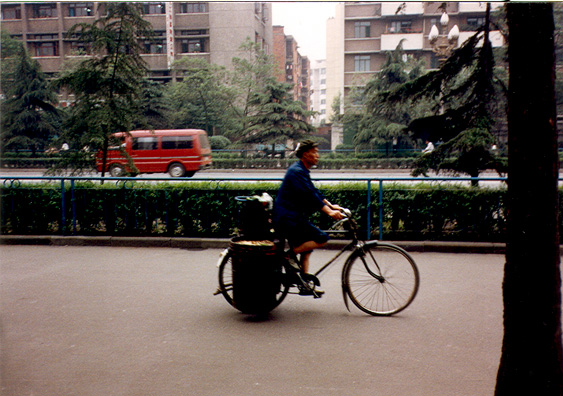 CHENG DU: Goods hauled in panniers.