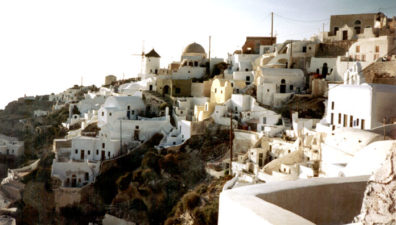 SANTORINI: At the northern tip of the island, the old city of Oia curves in a crescent of whitewashed houses.