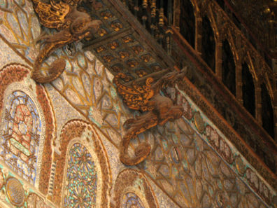 SEVILLA: The brackets supporting the balcony are winged dragons.