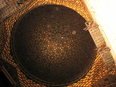 SEVILLA: Petitioners looked up to His Majesty beneath a dome whose magnificence testified to his power, wealth, taste—and the skill of his Moorish builders. The Mudéhar style evolved during the period that Christian conquerors were still under the spell of Moorish magnificence, and was created by workers at least nominally converted to Christianity, but whose creations breathed the spirit of Moorish Spain.
