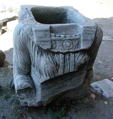 RED BASILICA: On the grounds is the headless hollow cult statue depicting Isis on one side (female)...