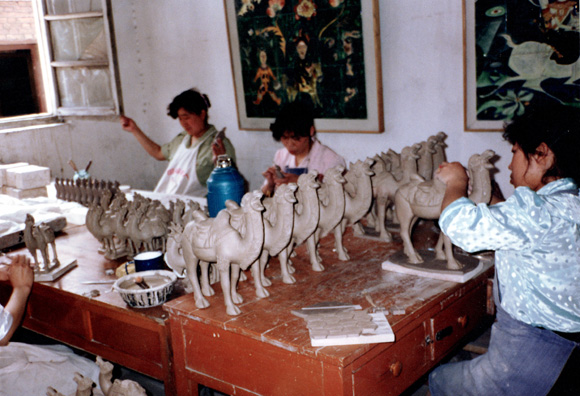 XIAN: On the way back, we visited a pottery factory where they make T'ang reproductions and lots of soldiers and horses.