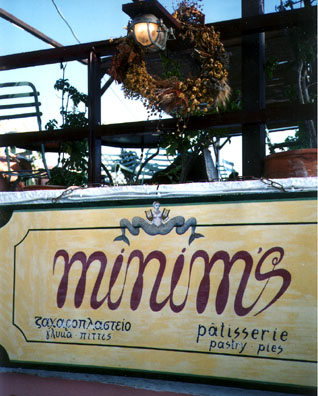 SANTORINI: While we ate a fine meal at this restaurant overlooking the caldara, a wedding procession went by, being led by a fiddler and guitarist to the church.