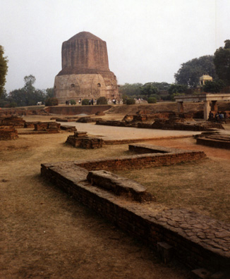 The Dhamekha Stupa at the left is the base of a vast column which was begun but never completed, and which is considered a sacred site by Buddhists.