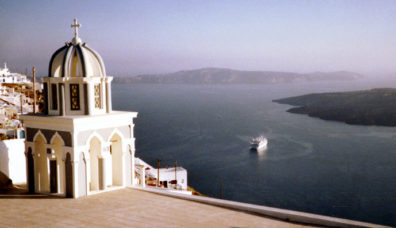 SANTORINI: A big cruise ship, typical of the mainly that sail into the caldera daily. Santorini is definitely a luxury tourist destination; don't try to go there with a backpack looking for a cheap room.