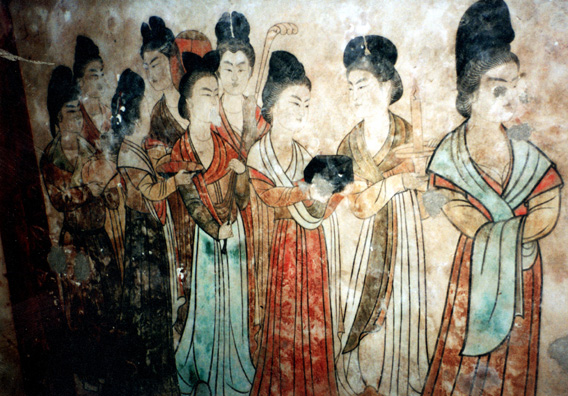 XIAN: I felt ill that night, woke in the middle of the night with a ranging fever and felt lousy all the next day (May 23), but climbed to the top of the Empress Wu's tomb (path lined by sculptures beheaded by peasants who thought guardian beasts were causing drouths. We descended into the tomb of a princess nearby where we saw this mural of women--the only picture I managed to take that day. m