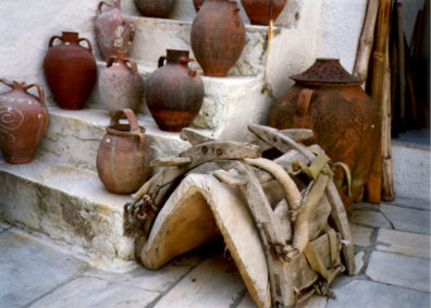 NAXOS: Pots and a donkey saddle.