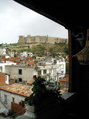 SELÇUK: The view from the Hotel Nazar rooftop restaurant to the nearby castle. Note the solar water heaters on almost every rooftop.