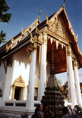 One of the more splendidly decorated temples in this Buddhist temple complex. These were often decorated with rather dim and damaged frescoes depicting events in the life of the Buddha. We were told that no attempt is made to restore them; when they become too damaged, they are simply painted over.