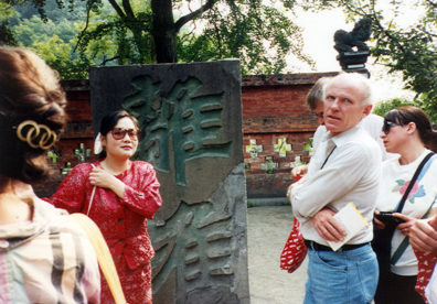 CHENG DU: Our local guide, in a tight skirt and high heels, strode past us briskly up steep mountain paths later in the day. Right: Doug Hughes and Linda Stone.