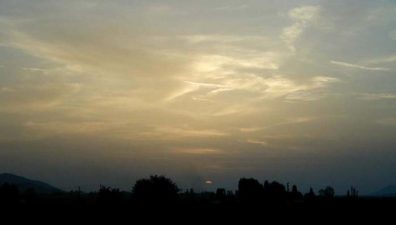 SELÇUK: Selçuk is a small town. We were reminded of this watching the sun set over the farmland which in ancient times used to be the harbor of Ephesus--now silted up.