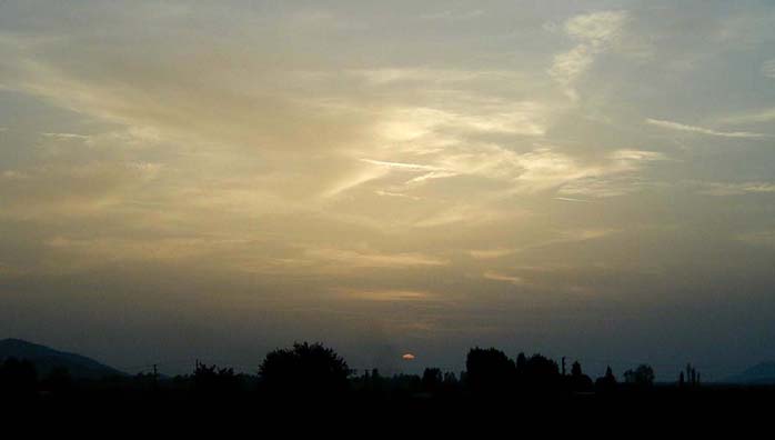 SELÇUK: Selçuk is a small town. We were reminded of this watching the sun set over the farmland which in ancient times used to be the harbor of Ephesus--now silted up.