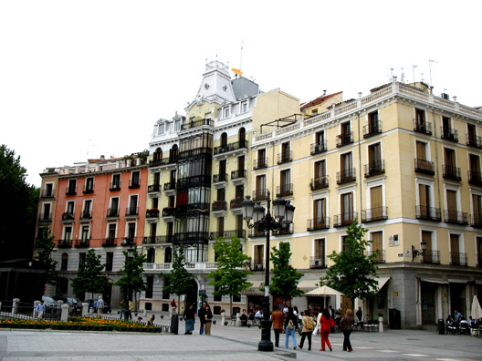 MADRID: Scene in a plaza in front of some attractive apartment buildings.