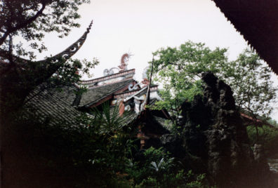 CHENG DU: More of the roof from a distance. The Communist government disapproved of the old curved eaves and they are rare in modern China.
