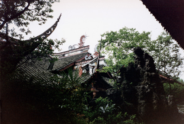 CHENG DU: More of the roof from a distance. The Communist government disapproved of the old curved eaves and they are rare in modern China.