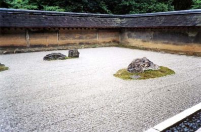 KYOTO: View of the Ryoanji Temple sand garden, the most famous in Japan. Its 15 rocks cannot be viewed simultaneously except from above. Tradition says that though there are 15 large stones altogether, only the Buddha can see all 15 at once. The pebbles are raked in patterns suggesting water rippling around "islands" of stone. "Sand" gardens are actually made of gravel, and are intended as objects of meditation. May 16, 1998