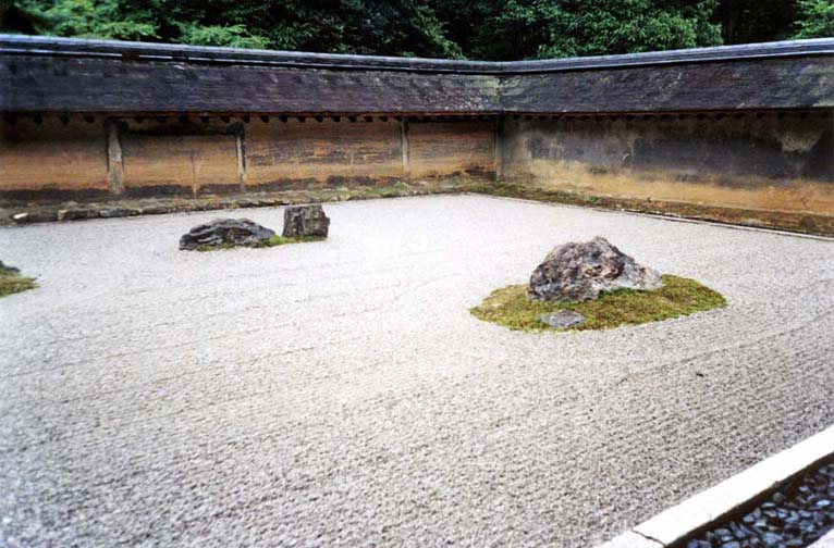 KYOTO: View of the Ryoanji Temple sand garden, the most famous in Japan. Its 15 rocks cannot be viewed simultaneously except from above. Tradition says that though there are 15 large stones altogether, only the Buddha can see all 15 at once. The pebbles are raked in patterns suggesting water rippling around "islands" of stone. "Sand" gardens are actually made of gravel, and are intended as objects of meditation. May 16, 1998