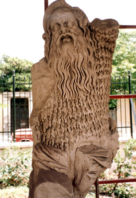 ATHENS: a sculpture of a sheepskin-clad satyr, traditional companion of Dionysus.