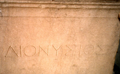 ATHENS: Did a sculpture of Dionysus once rest on this pedestal? It has his name carved on it.